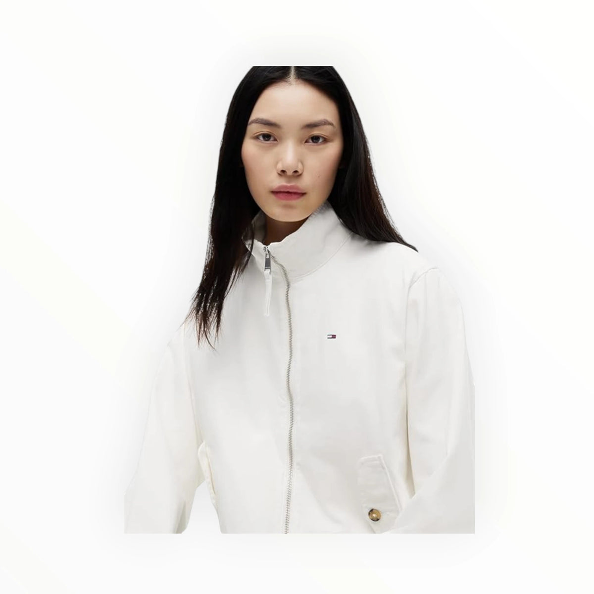 White Tommy Hilfiger women's jacket from Tommy Jeans, featuring a stylish, casual design with brand logo details.