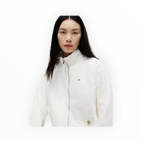 White Tommy Hilfiger women's jacket from Tommy Jeans, featuring a stylish, casual design with brand logo details.