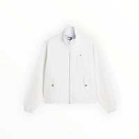 White Tommy Hilfiger women's vest with logo details, featuring a zip-up front and stylish casual design.