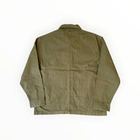Tommy Hilfiger Chore Jacket by BITAMBS featuring durable workwear design, with a classic fit and utility pockets.