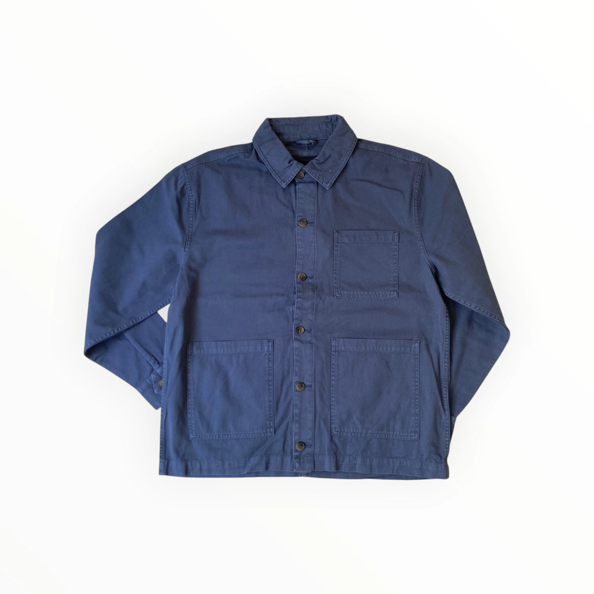 Veste Tommy Hilfiger Workwear, détail de poche sur la Chore Jacket homme, inspiration utilitaire et style casual.