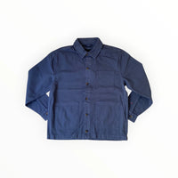 Veste Tommy Hilfiger Workwear, détail de poche sur la Chore Jacket homme, inspiration utilitaire et style casual.
