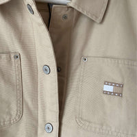 BITAMBS Tommy Hilfiger beige cotton canvas workwear jacket with utility pockets and striped interior lining.